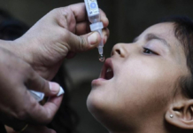 Child getting immunized against polio