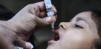 Child getting immunized against polio