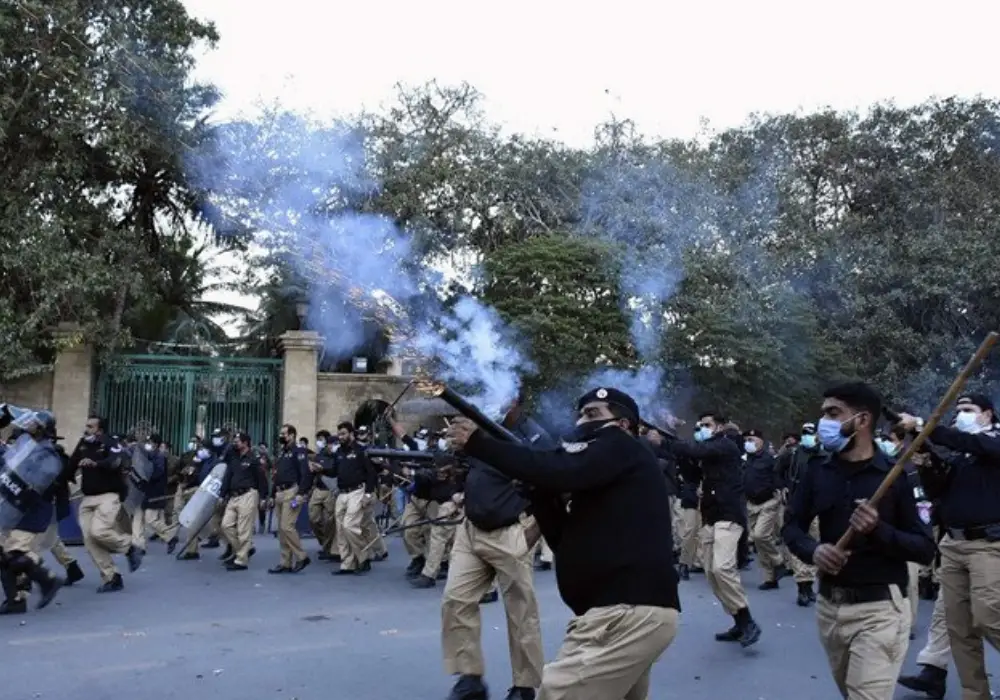 Police shelling at MQM rally; woman unconscious