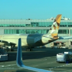 An Etihad Airways Airbus A350-1000 at the gate in October 2026